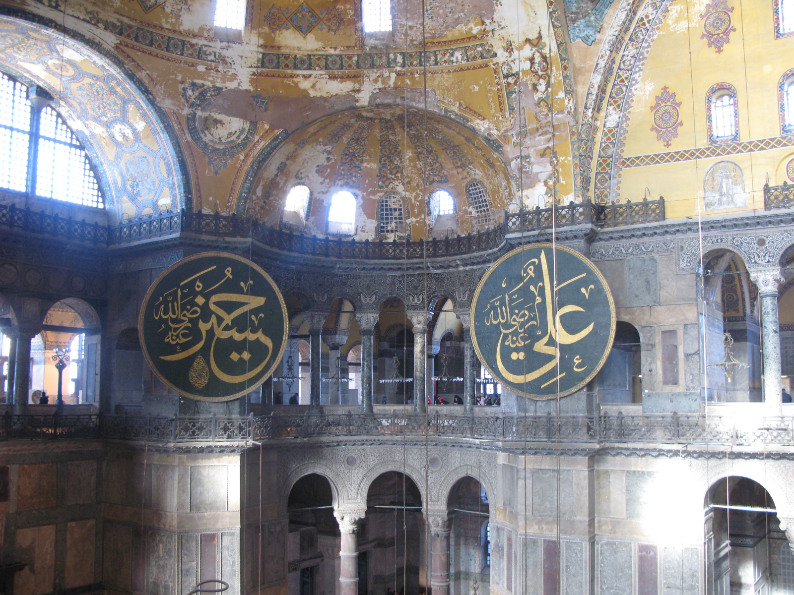 Interior of Hagia Sophia — dome and calligraphy medallions